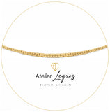 Collier en chute maille forçat haricot 5.6 mm or jaune 18 carats 42cm