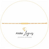 Gourmette personnalisée enfant ado bracelet prénom plaque rectangulaire diamantée biseautée maille Figaro Or jaune 18 carats