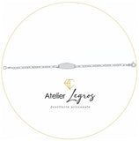 Bijou Gourmette personnalisée bébé bracelet prénom plaque ovale chaîne maille alternée Or blanc 18 carats joaillerie legros bijouterie