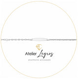 Bijou Gourmette personnalisée bébé bracelet prénom plaque ovale maille forçat marine Or blanc 18 carats joaillerie legros bijouterie