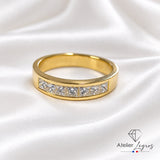 Alliance en or jaune 18 carats avec 7 diamants taille princesse sertis rail