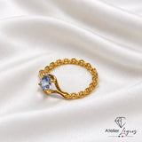 Bijou Bague articulée en or jaune 18 carats avec saphir bleu clair joaillerie legros bijouterie