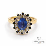 Bague marguerite saphir et diamants double entourage en or jaune 18 carats