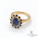 Bague marguerite saphir et diamants double entourage en or jaune 18 carats