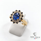 Bague marguerite saphir et diamants double entourage en or jaune 18 carats