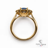 Bague marguerite saphir et diamants double entourage en or jaune 18 carats