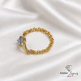 Bijou Bague articulée en or jaune 18 carats avec saphir bleu clair joaillerie legros bijouterie