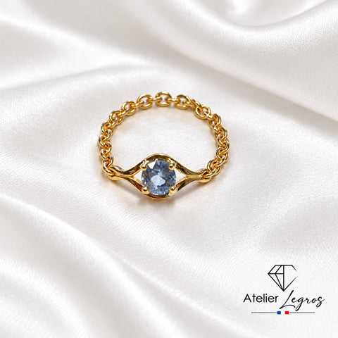 Bague articulée en or jaune 18 carats avec saphir bleu clair
