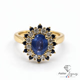 Bague marguerite saphir et diamants double entourage en or jaune 18 carats