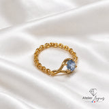 Bijou Bague articulée en or jaune 18 carats avec saphir bleu clair joaillerie legros bijouterie