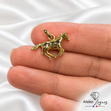 Pendentif cheval au galop en or jaune 18 carats