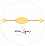 Gourmette bébé en or jaune 18 carats bracelet prénom personnalisé motif fleurs