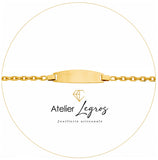 Bijou Gourmette bébé en or jaune 18 carats bracelet prénom plaque ovale maille forçat diamantée joaillerie legros bijouterie