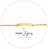 Bijou Gourmette bébé en or jaune 18 carats bracelet prénom maille forçat diamantée plaque rectangulaire 2,4 cm joaillerie legros bijouterie