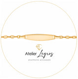 Gourmette bébé en or jaune 18 carats bracelet prénom plaque ovale diamantée maille marine battue
