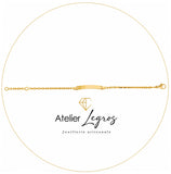 Bijou Gourmette bébé en or jaune 18 carats bracelet prénom maille forçat diamantée plaque rectangulaire 2,4 cm joaillerie legros bijouterie