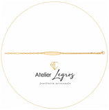 Gourmette bébé en or jaune 18 carats bracelet prénom plaque ovale diamantée maille marine battue